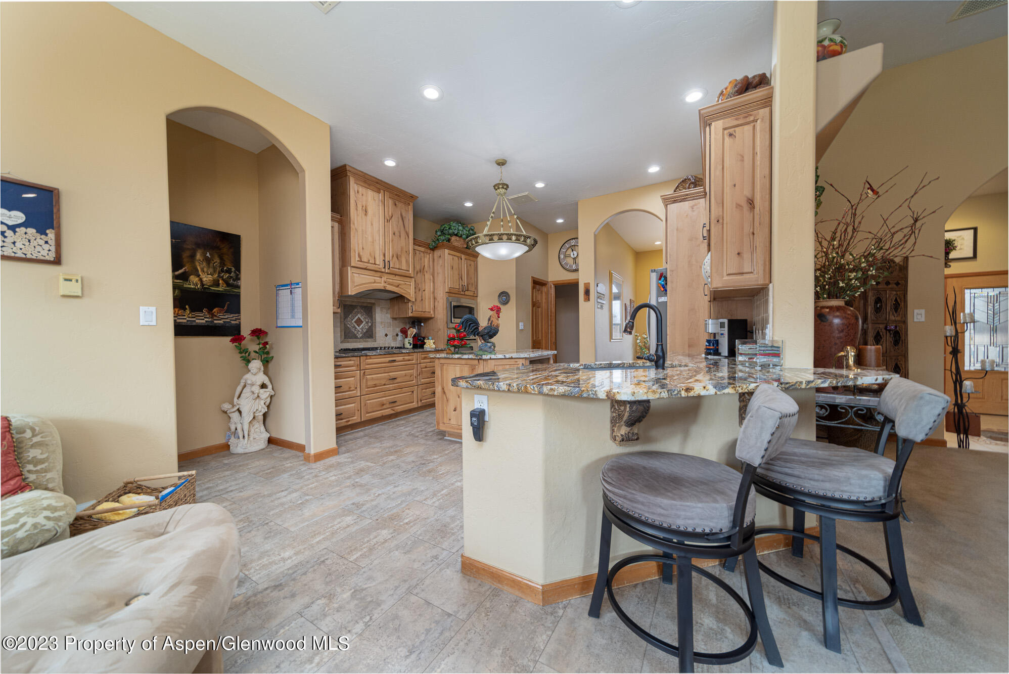 685 Roundup Drive Grand Junction, CO 81507 - Photo 12 of 39 a large kitchen with a table and chairs