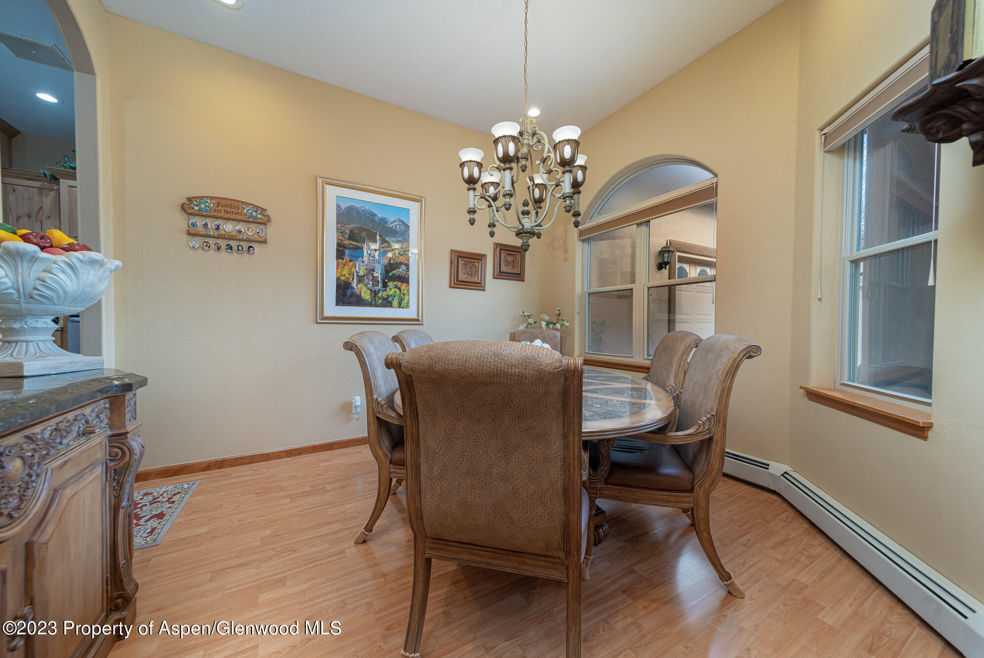 685 Roundup Drive Grand Junction, CO 81507 - Photo 15 of 39 a view of a dining room with furniture and a chandelier