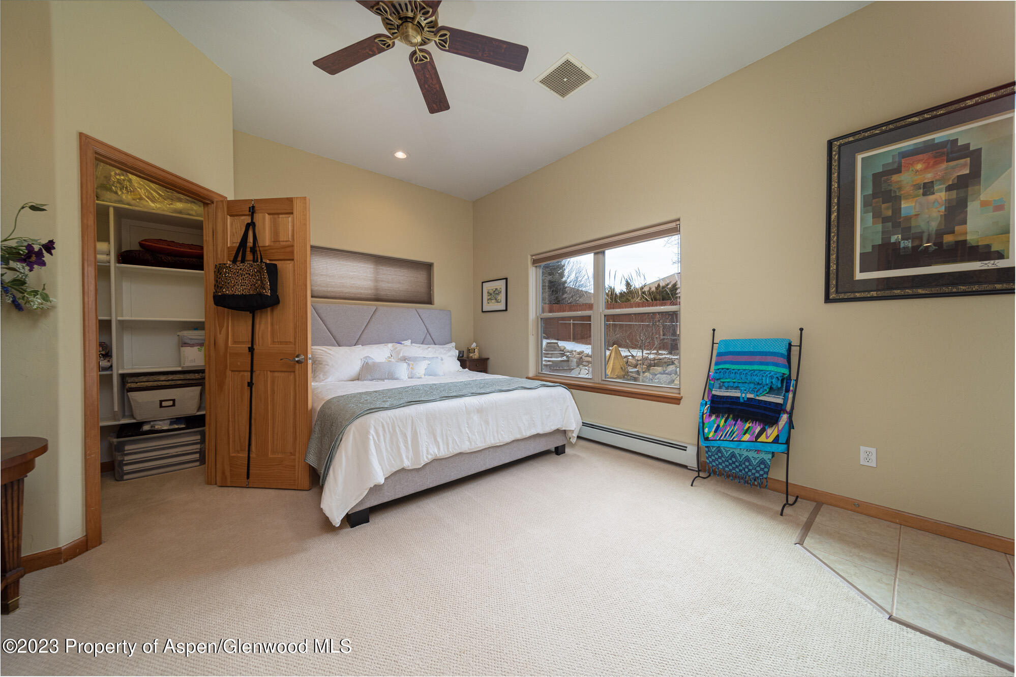685 Roundup Drive Grand Junction, CO 81507 - Photo 22 of 39 a bedroom with a bed and a tv