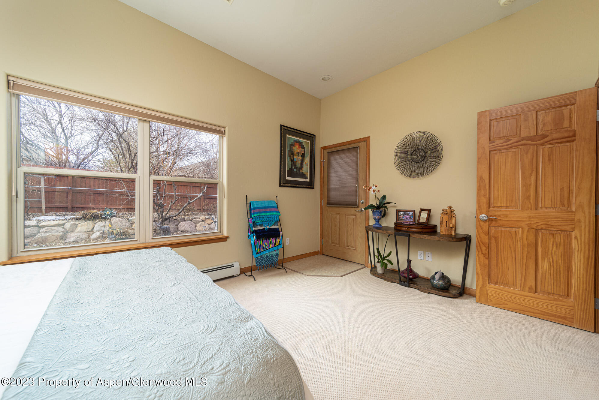 685 Roundup Drive Grand Junction, CO 81507 - Photo 24 of 39 a bed room with a bed and window