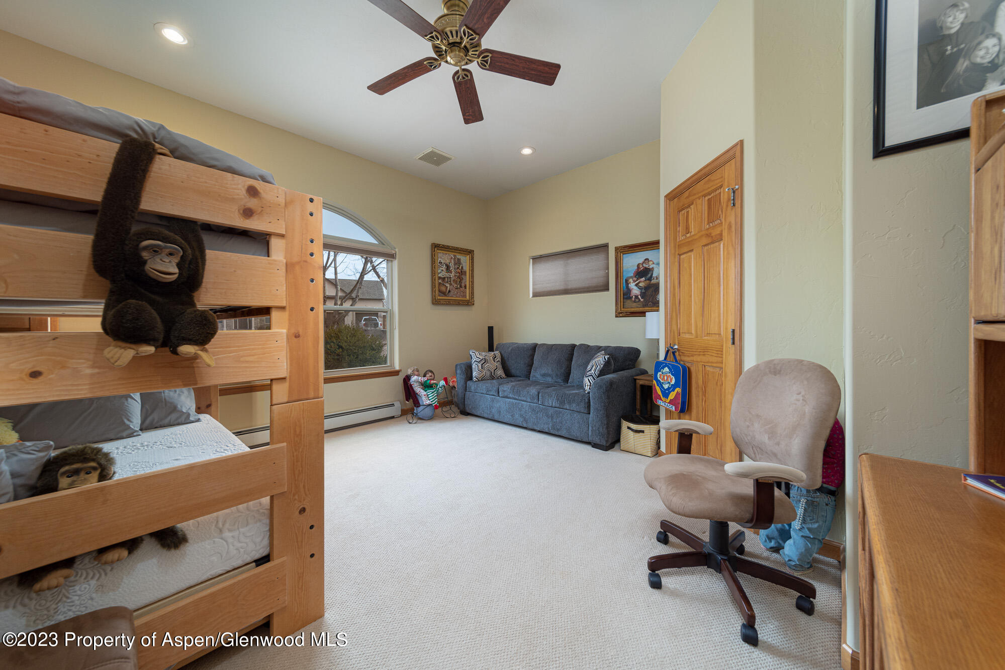 685 Roundup Drive Grand Junction, CO 81507 - Photo 27 of 39 a living room with furniture and a window
