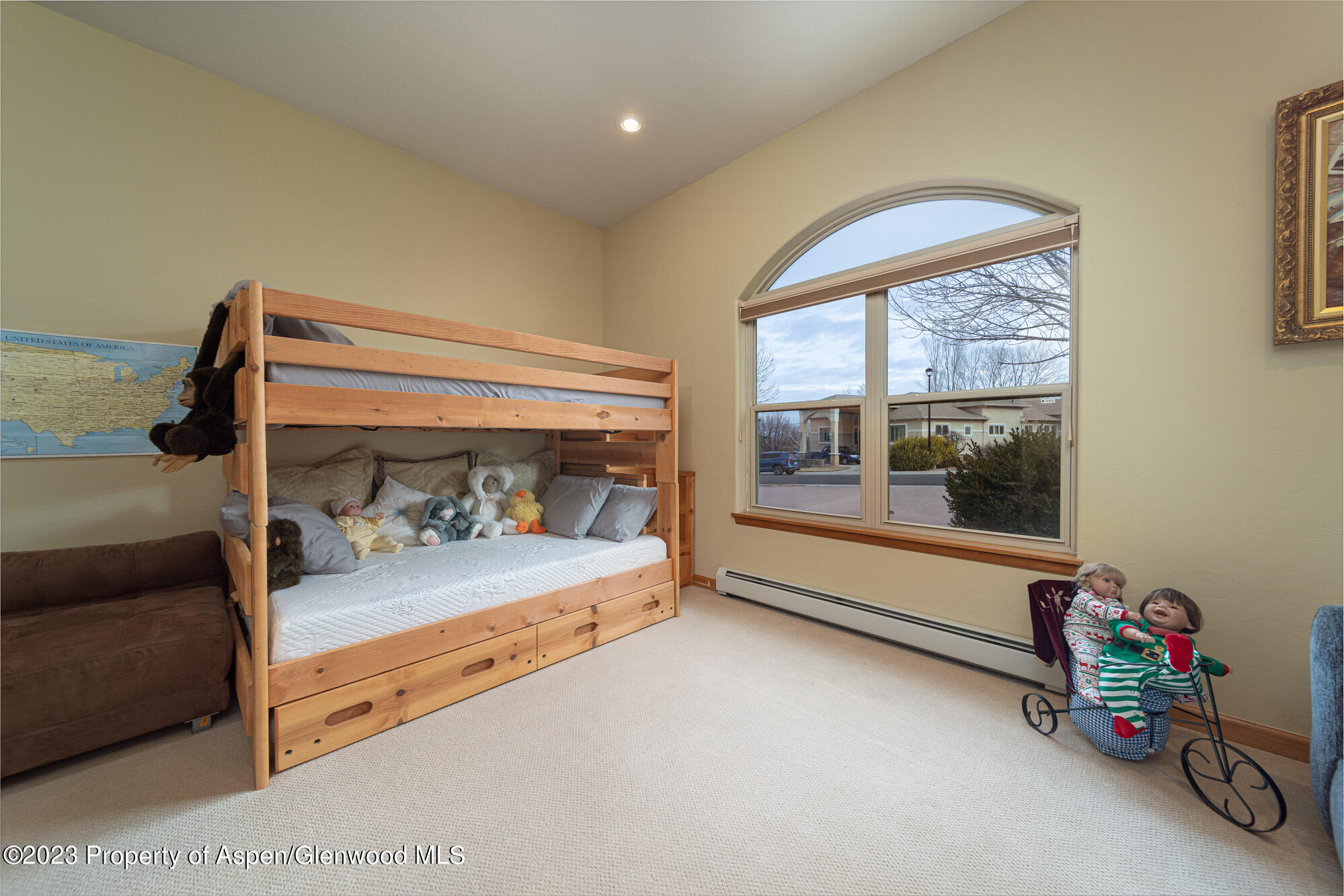685 Roundup Drive Grand Junction, CO 81507 - Photo 28 of 39 a bedroom with furniture and a large window