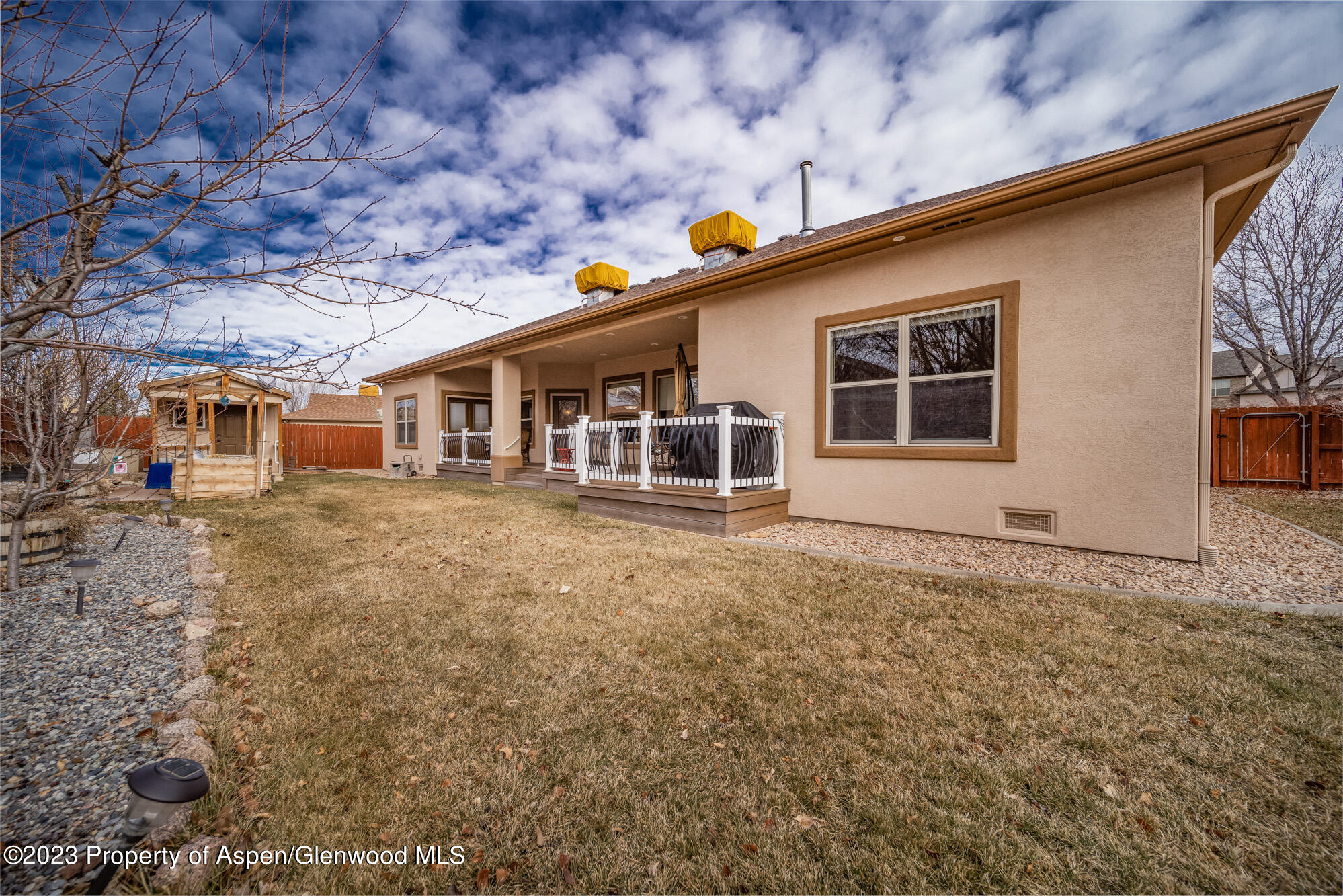 685 Roundup Drive Grand Junction, CO 81507 - Photo 38 of 39 a front view of a house with a garden