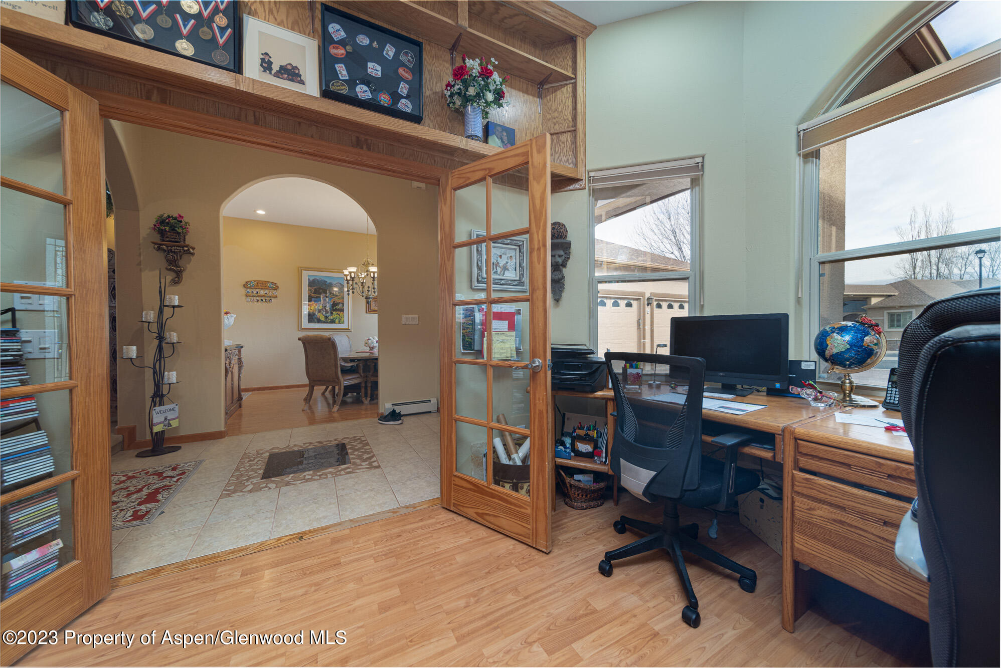 685 Roundup Drive Grand Junction, CO 81507 - Photo 6 of 39 a view of a livingroom with workspace and a window