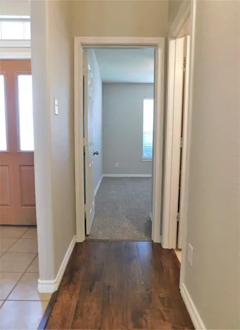 an empty room with closet area