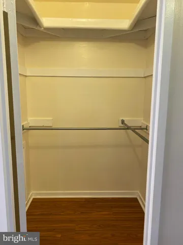 a bathroom with a bathtub and a toilet