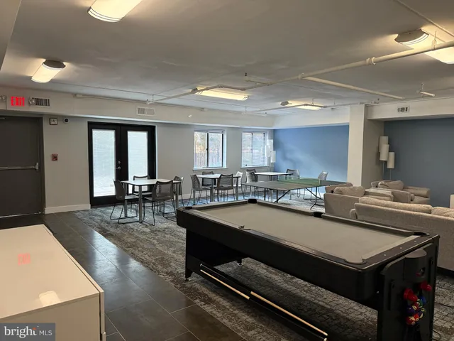 a view of a terrace with sitting area