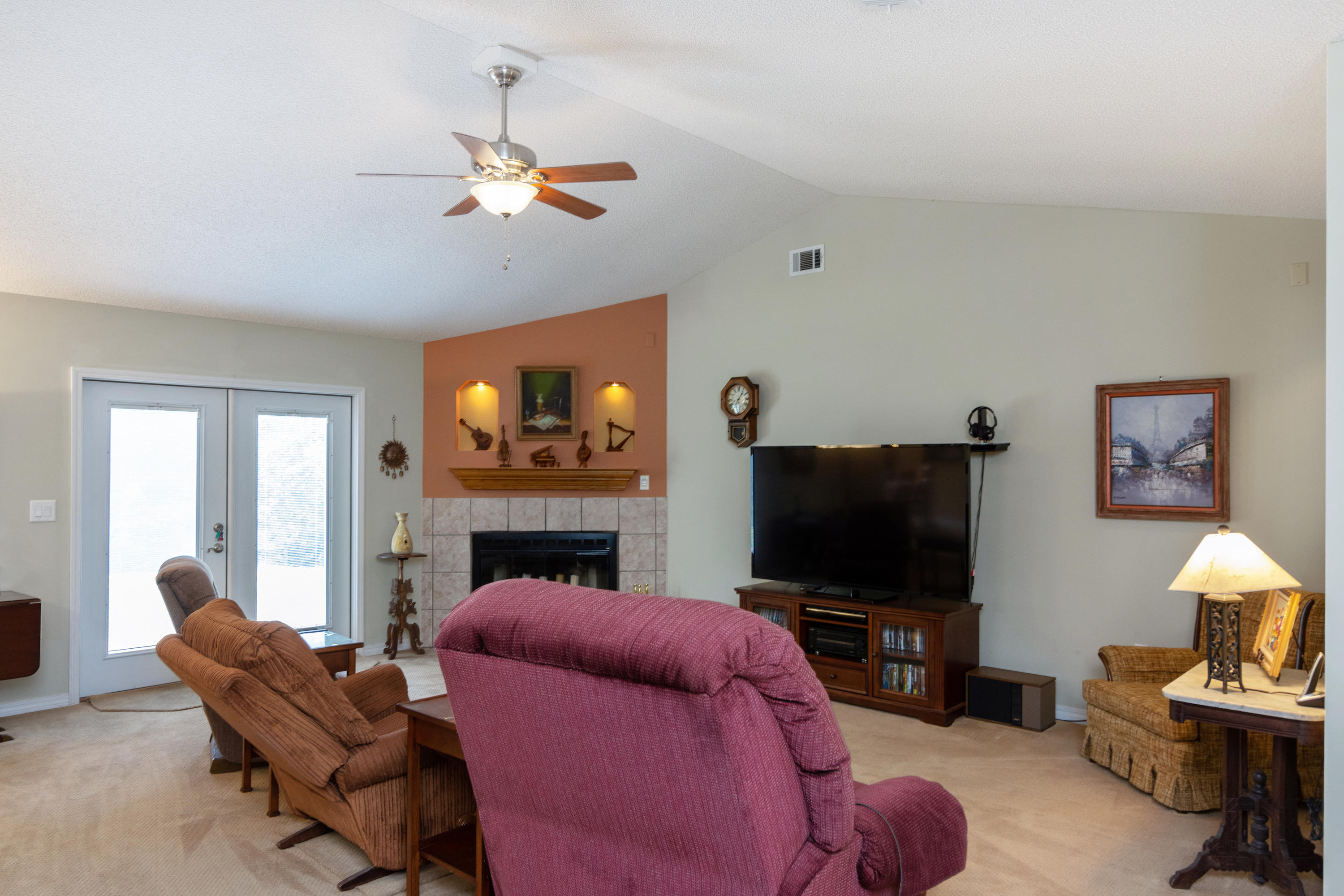 6151 Beasley Road Crestview, FL 32536 - Photo 17 of 49 a living room with furniture and a flat screen tv