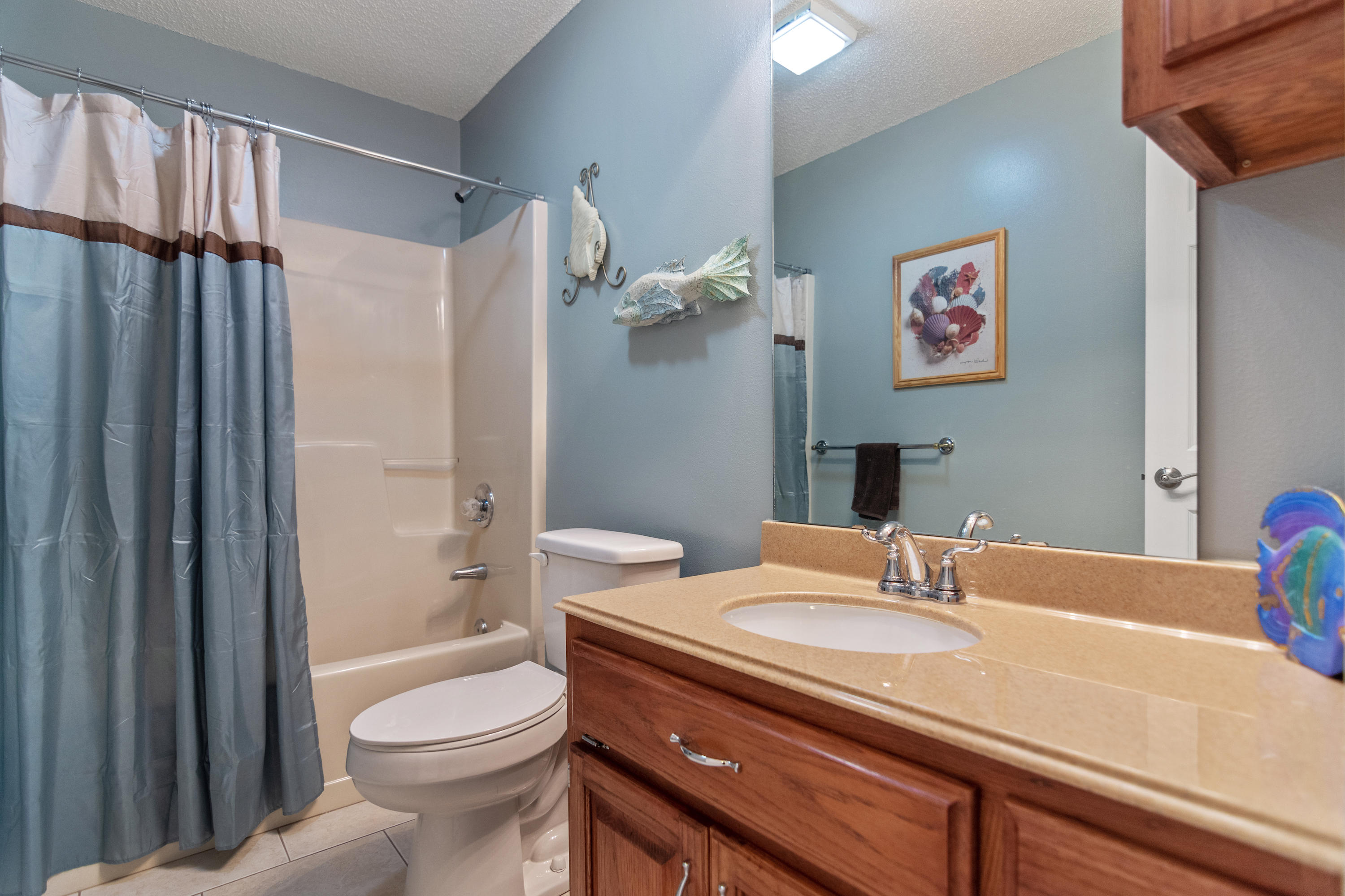 6151 Beasley Road Crestview, FL 32536 - Photo 47 of 49 a bathroom with a sink toilet and shower