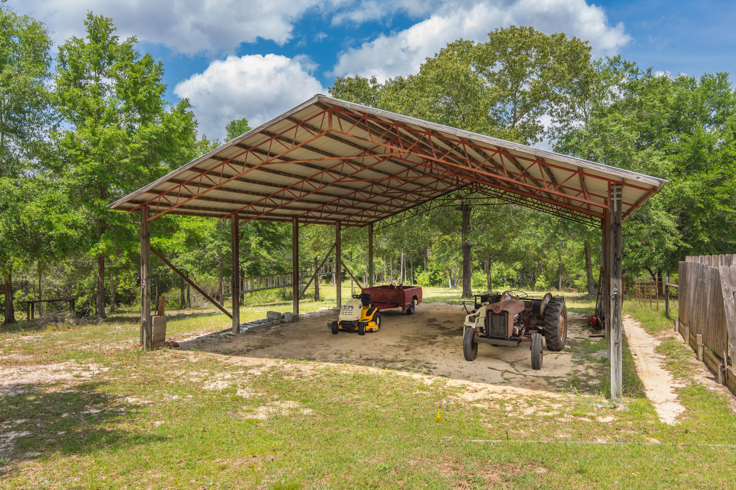 6151 Beasley Road Crestview, FL 32536 - Photo 6 of 49 a view of outdoor space yard deck patio and outdoor kitchen