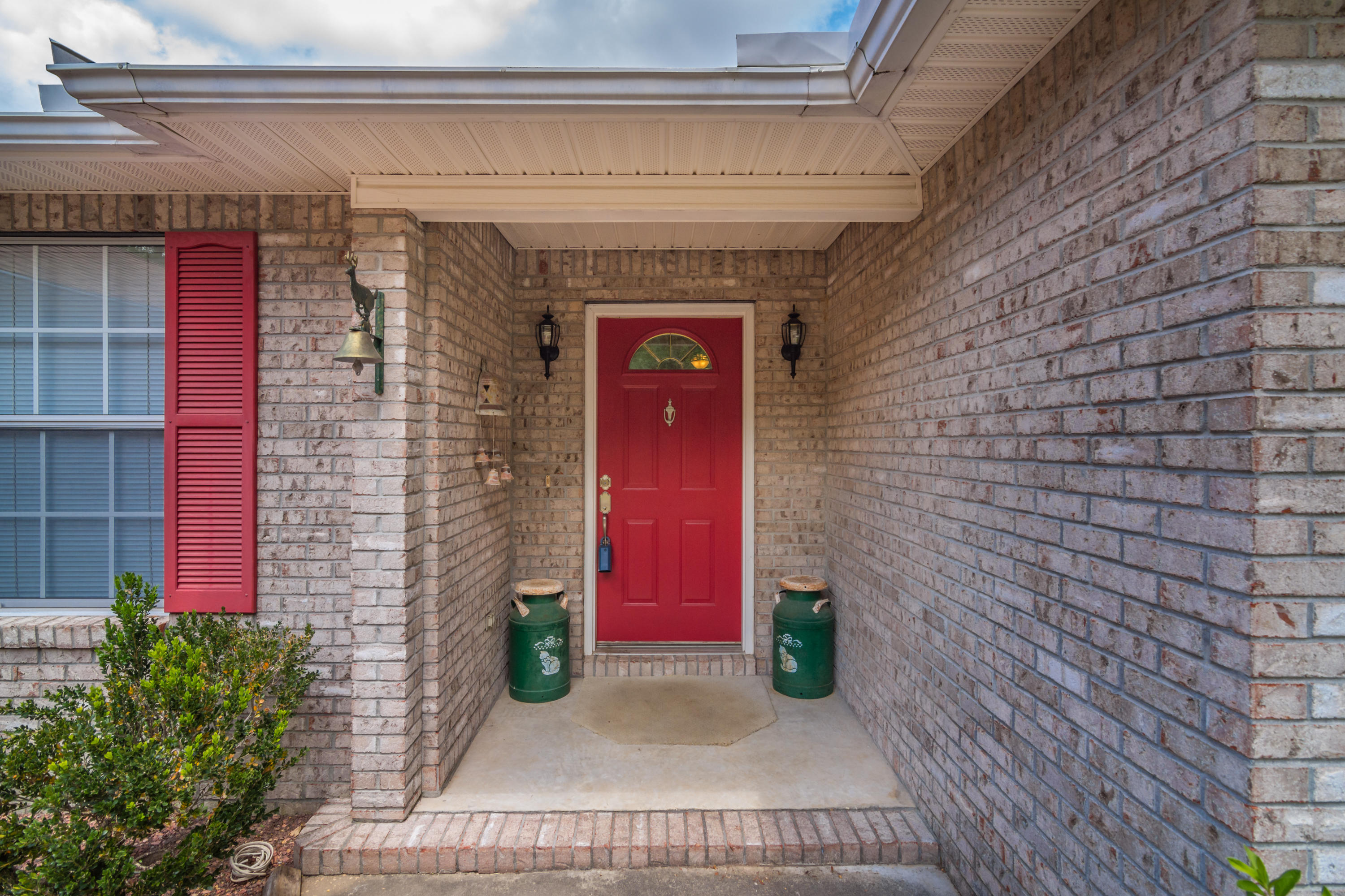 6151 Beasley Road Crestview, FL 32536 - Photo 7 of 49 a view of a door and brick wall