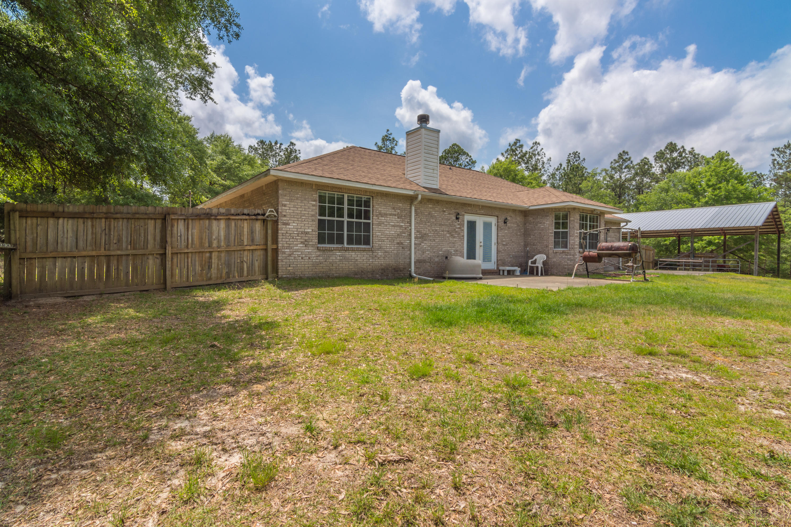 6151 Beasley Road Crestview, FL 32536 - Photo 9 of 49 a view of a yard in front of house