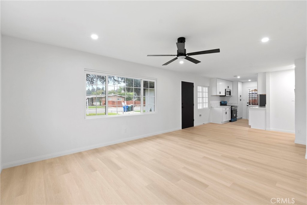 5847 Meadowbrook Lane Riverside, CA 92504 - Photo 6 of 31 a view of an empty room with a window