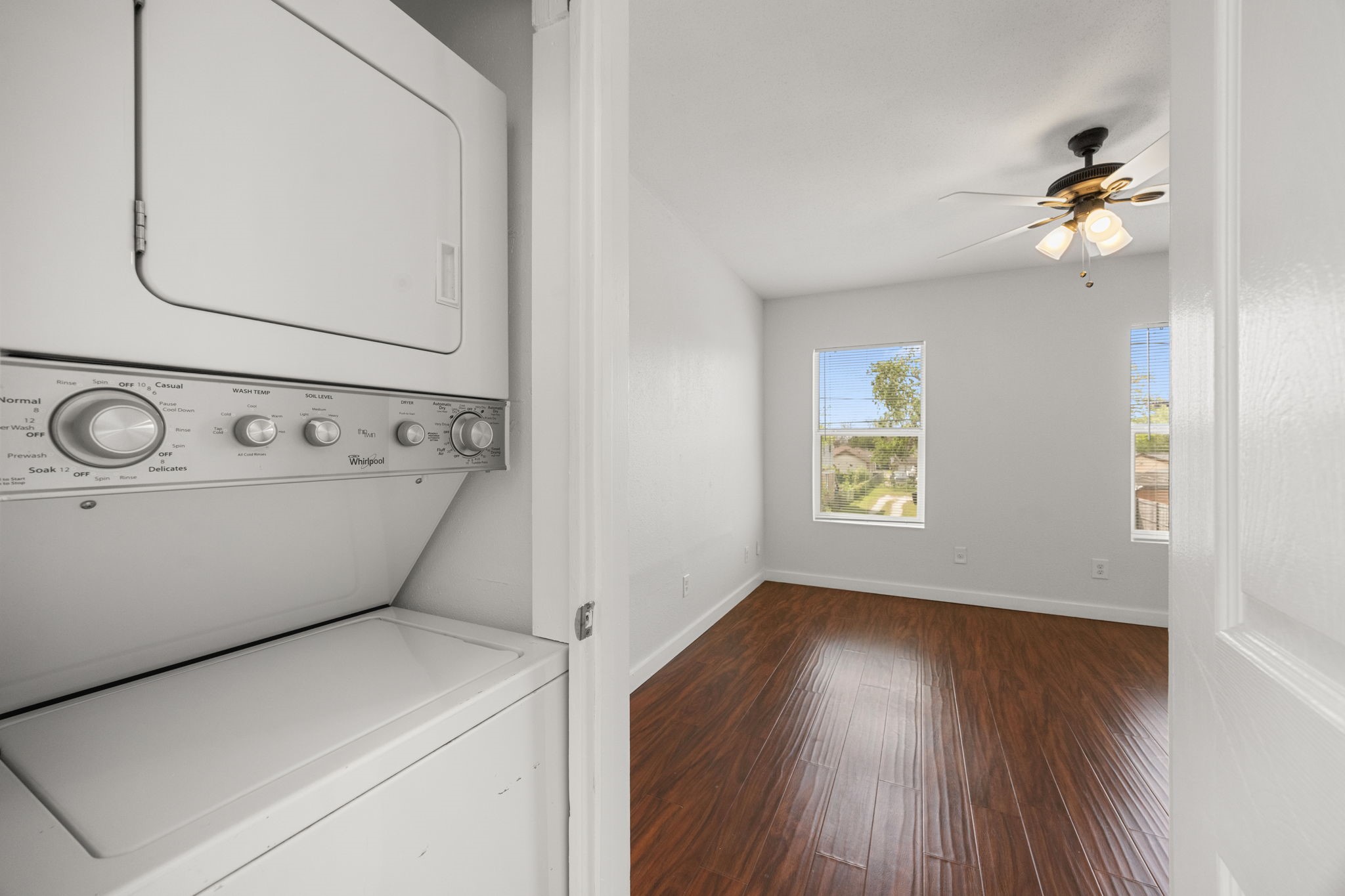 7 Latham Street Houston, TX 77011 - Photo 13 of 23 Convenient in-unit stacked washer and dryer, adding everyday functionality and tenant appeal.