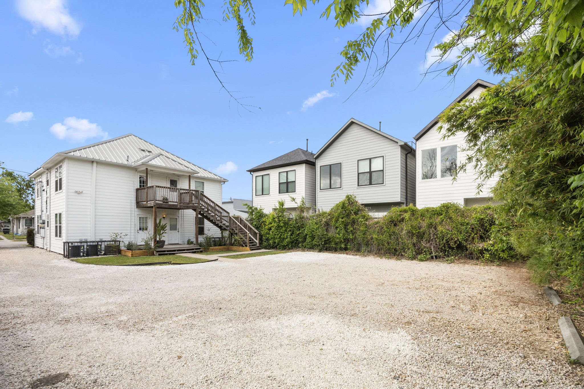 7 Latham Street Houston, TX 77011 - Photo 21 of 23 Well-maintained rear exterior featuring private entrances.