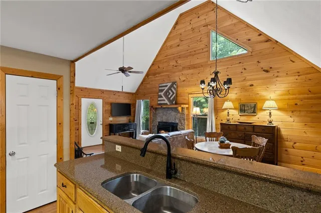 a kitchen with a sink and a refrigerator