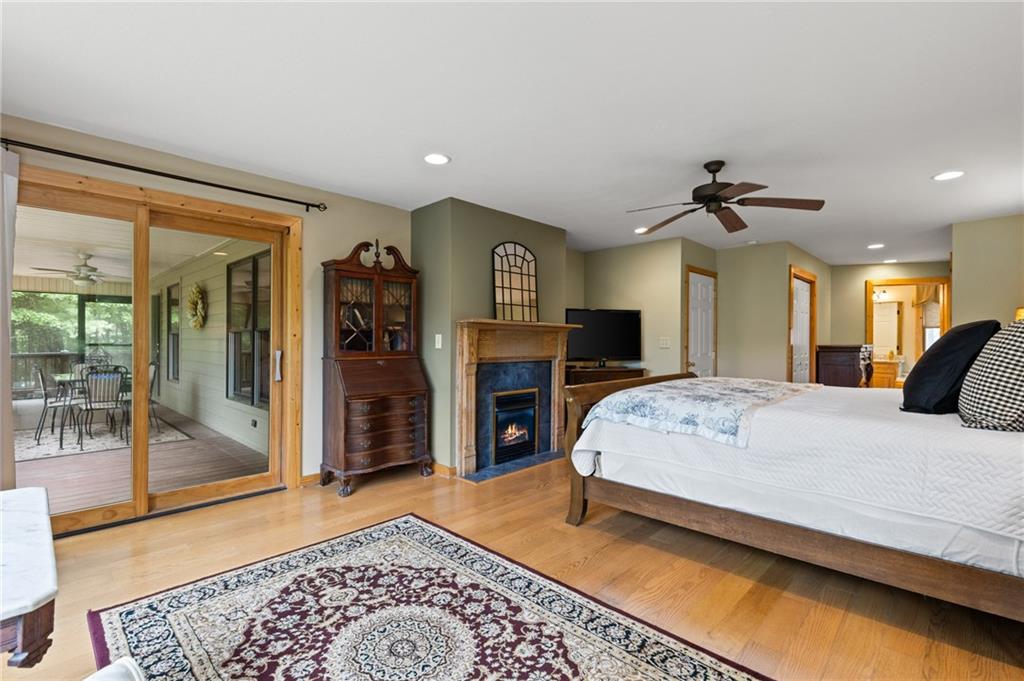 2930 Hicks Gap Road Blairsville, GA 30512 - Photo 17 of 44 a bed room with a bed and a television