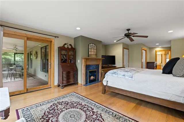 a bed room with a bed and a television