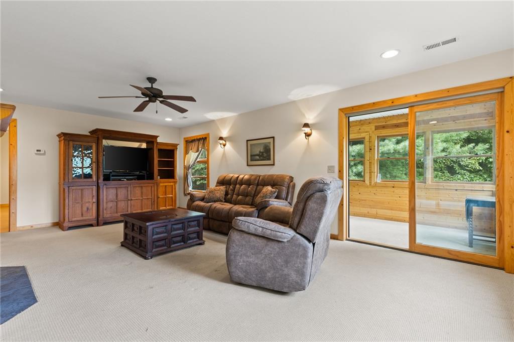2930 Hicks Gap Road Blairsville, GA 30512 - Photo 28 of 44 a living room with furniture and a flat screen tv