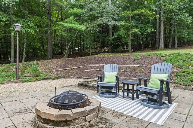a patio with table and chairs