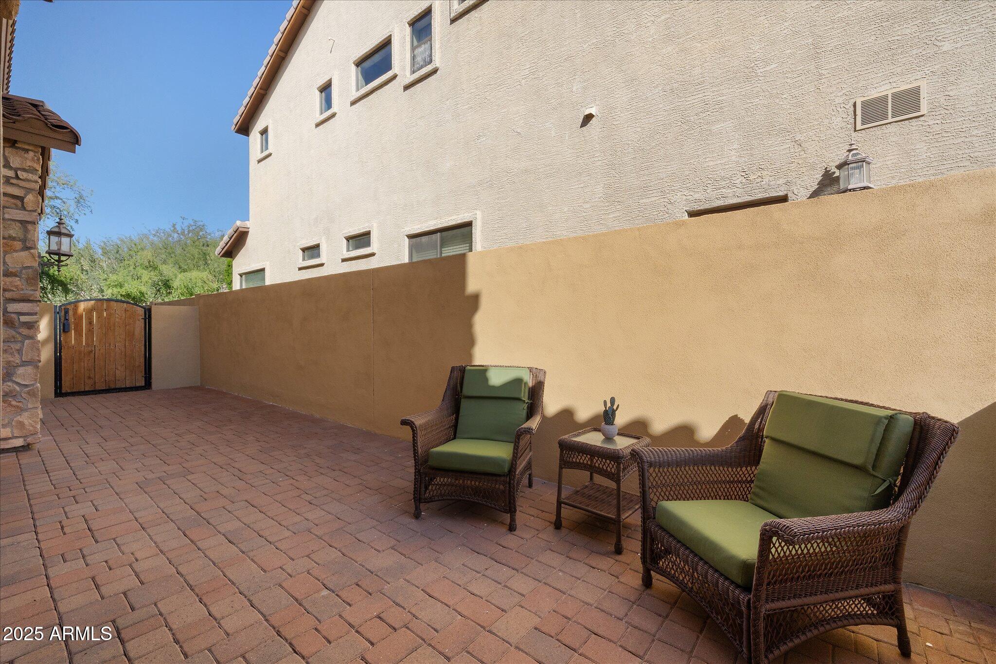 8536 East Inca Street Mesa, AZ 85207 - Photo 8 of 44 a view of a terrace with furniture