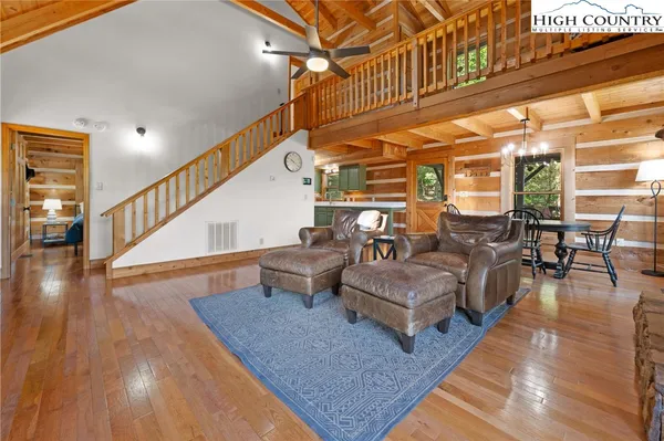 a kitchen with a sink and a large window