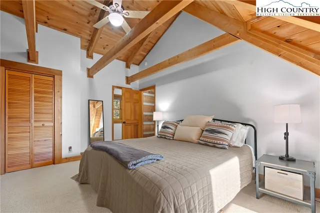 a view of room with window and furniture