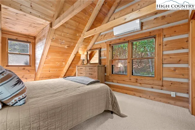 a view of a porch with wooden floor
