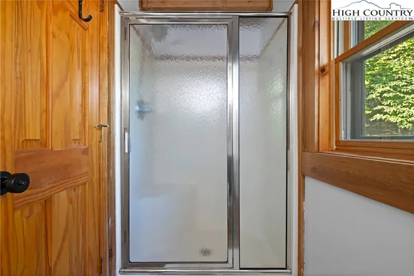 a view of a porch with wooden floor