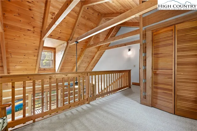 a view of balcony with wooden floor