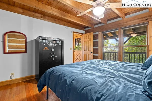 a view of balcony with wooden floor