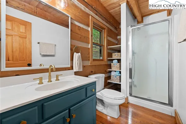 a view of balcony with wooden floor