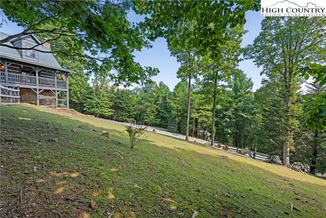 an aerial view of a house with a garden