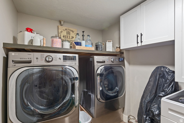255 North 1600 West, Unit 60 Provo, UT 84601 - Photo 14 of 22 Laundry area with cabinet space and independent washer and dryer