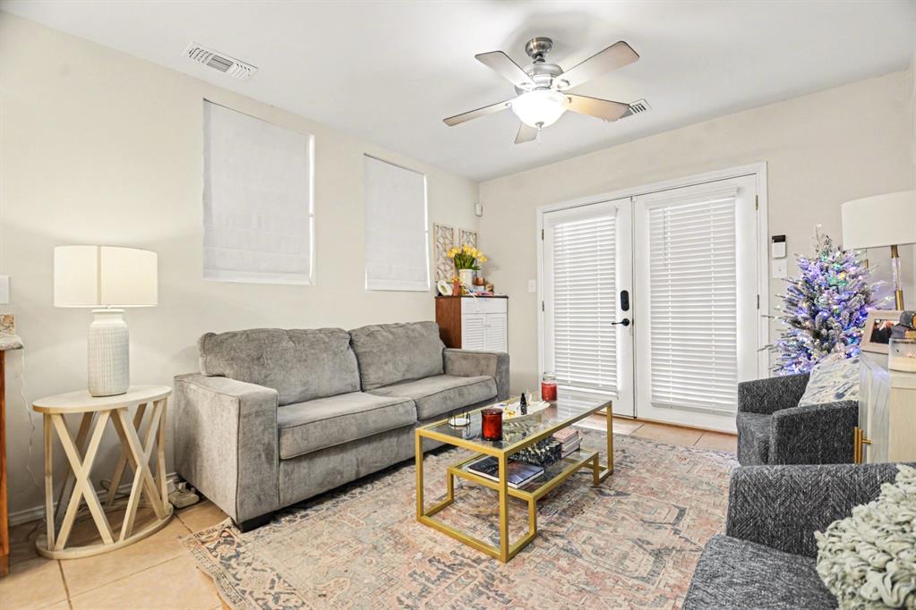 14140 Hillcrest Road Dallas, TX 75254 - Photo 20 of 29 a living room with furniture and wooden floor