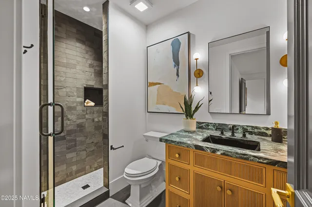 a black and white photo of a bathroom