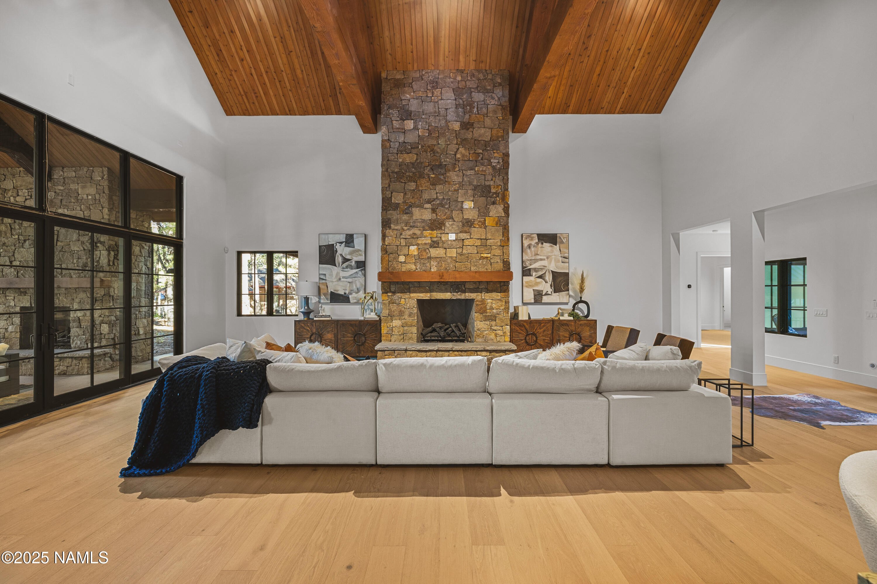 2732 Lindberg Flagstaff, AZ 86005 - Photo 5 of 56 a living room with fireplace furniture and a large window