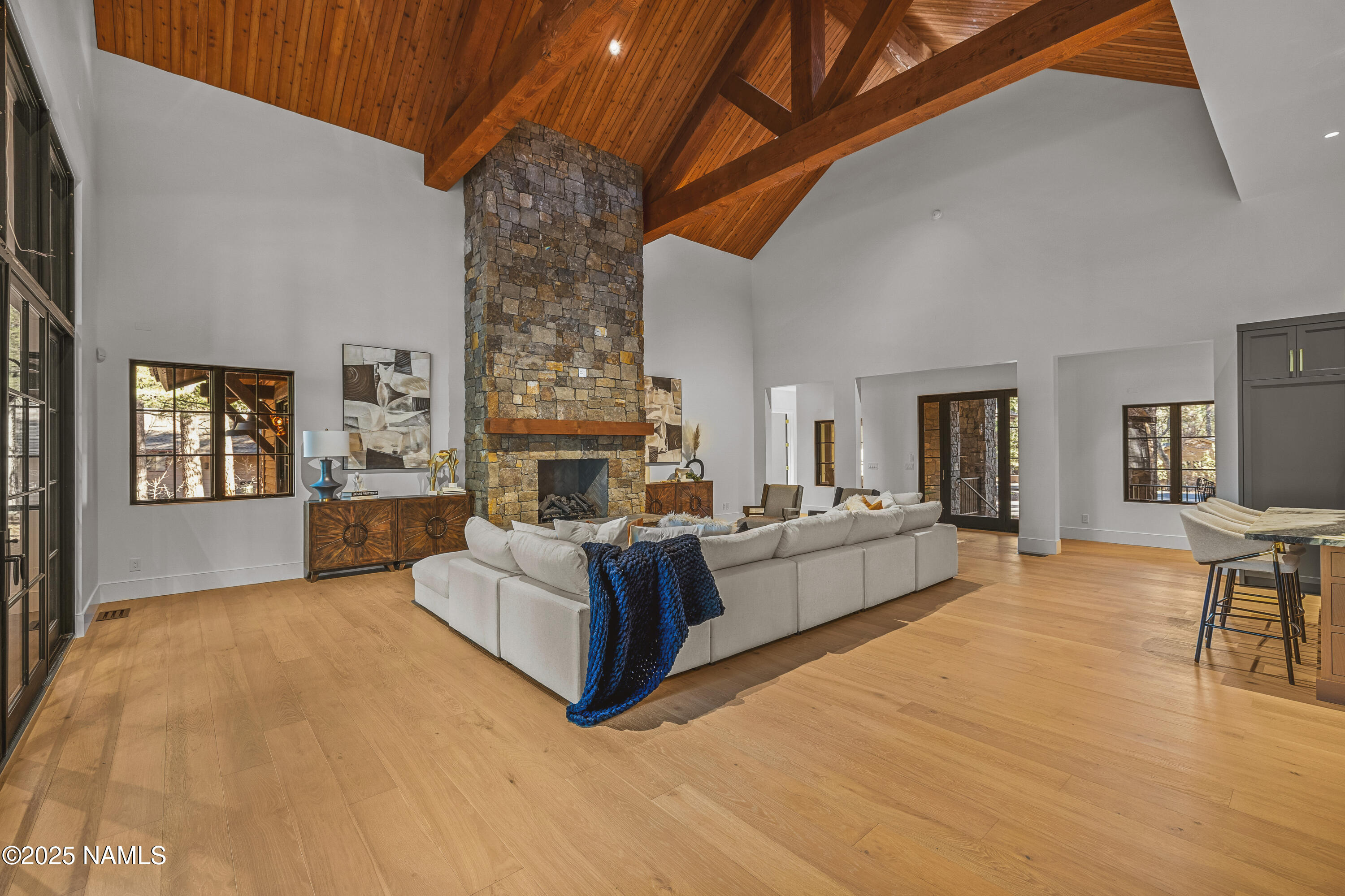 2732 Lindberg Flagstaff, AZ 86005 - Photo 7 of 56 a living room with furniture and a fireplace
