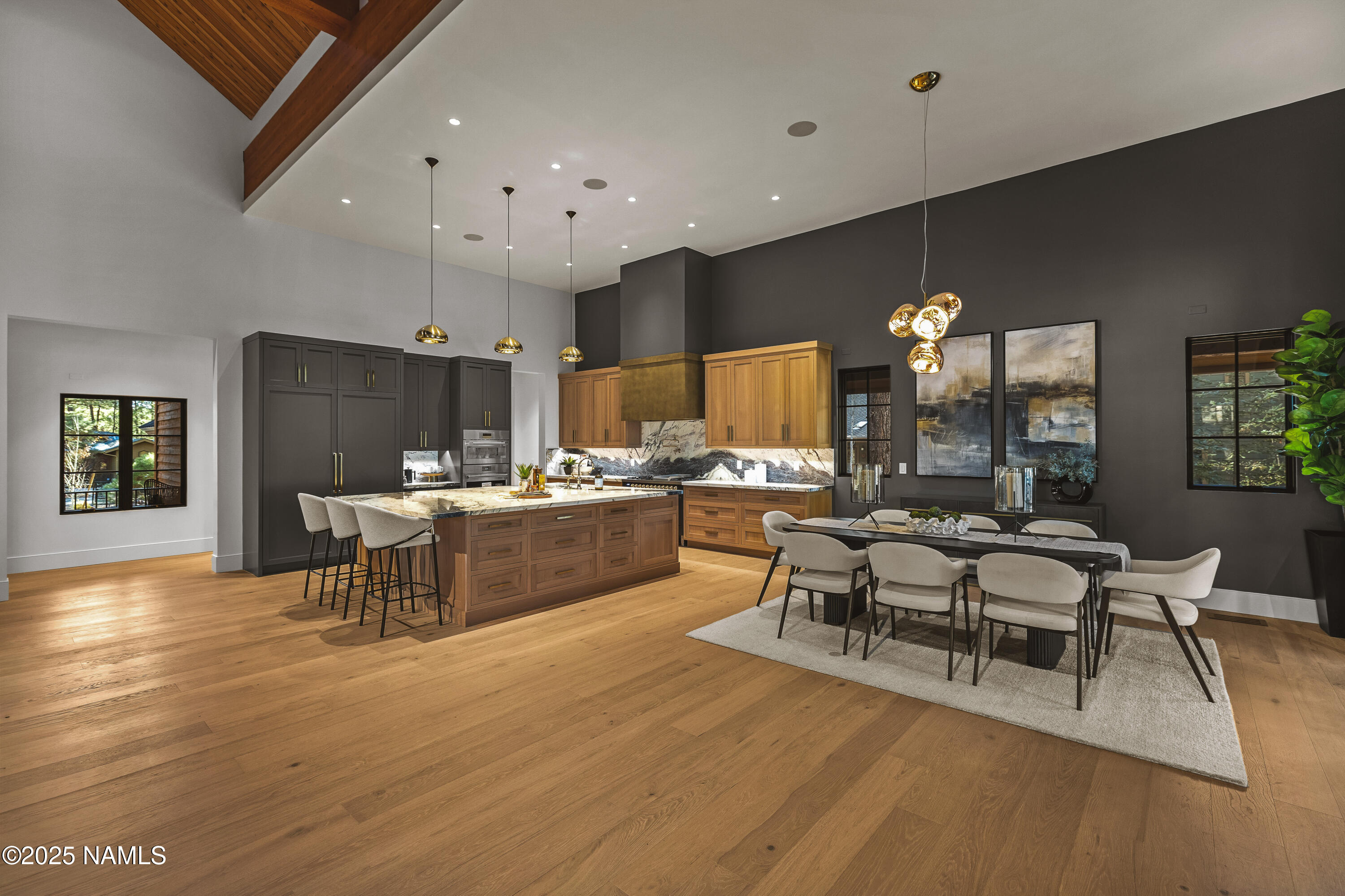 2732 Lindberg Flagstaff, AZ 86005 - Photo 10 of 56 a large kitchen with a table and chairs