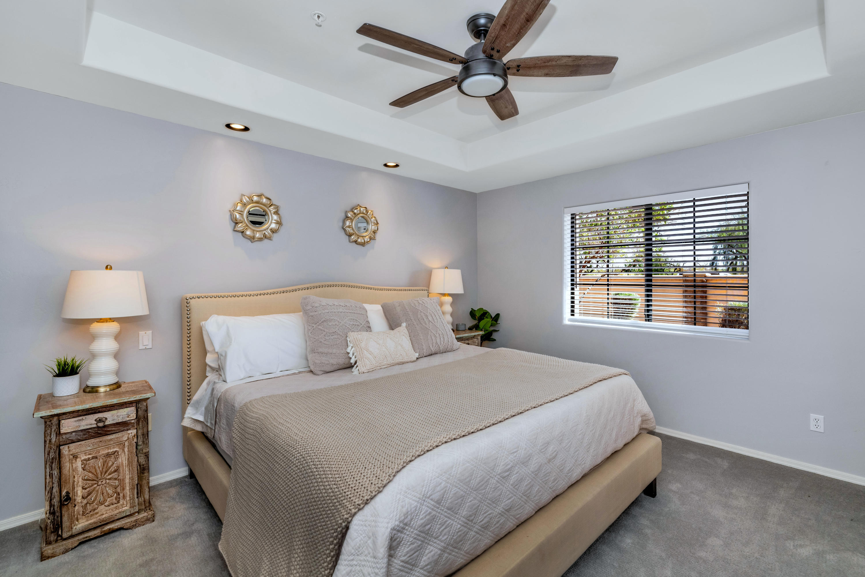 7609 East Indian Bend Road, Unit 1015 Scottsdale, AZ 85250 - Photo 11 of 30 a bedroom with a bed and a window