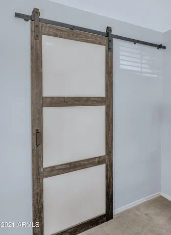 a view of a swimming pool with outdoor seating