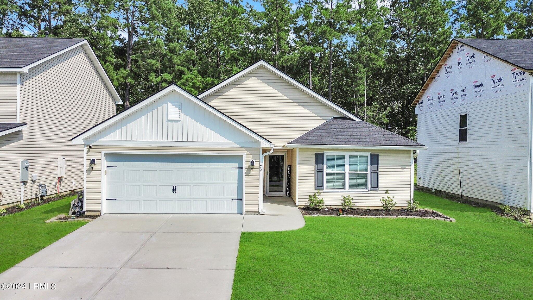 79 Old Mill Crossing Bluffton, SC 29910 - Photo 2 of 41 47-web-or-mls-dji_fly_20240811_231116_49