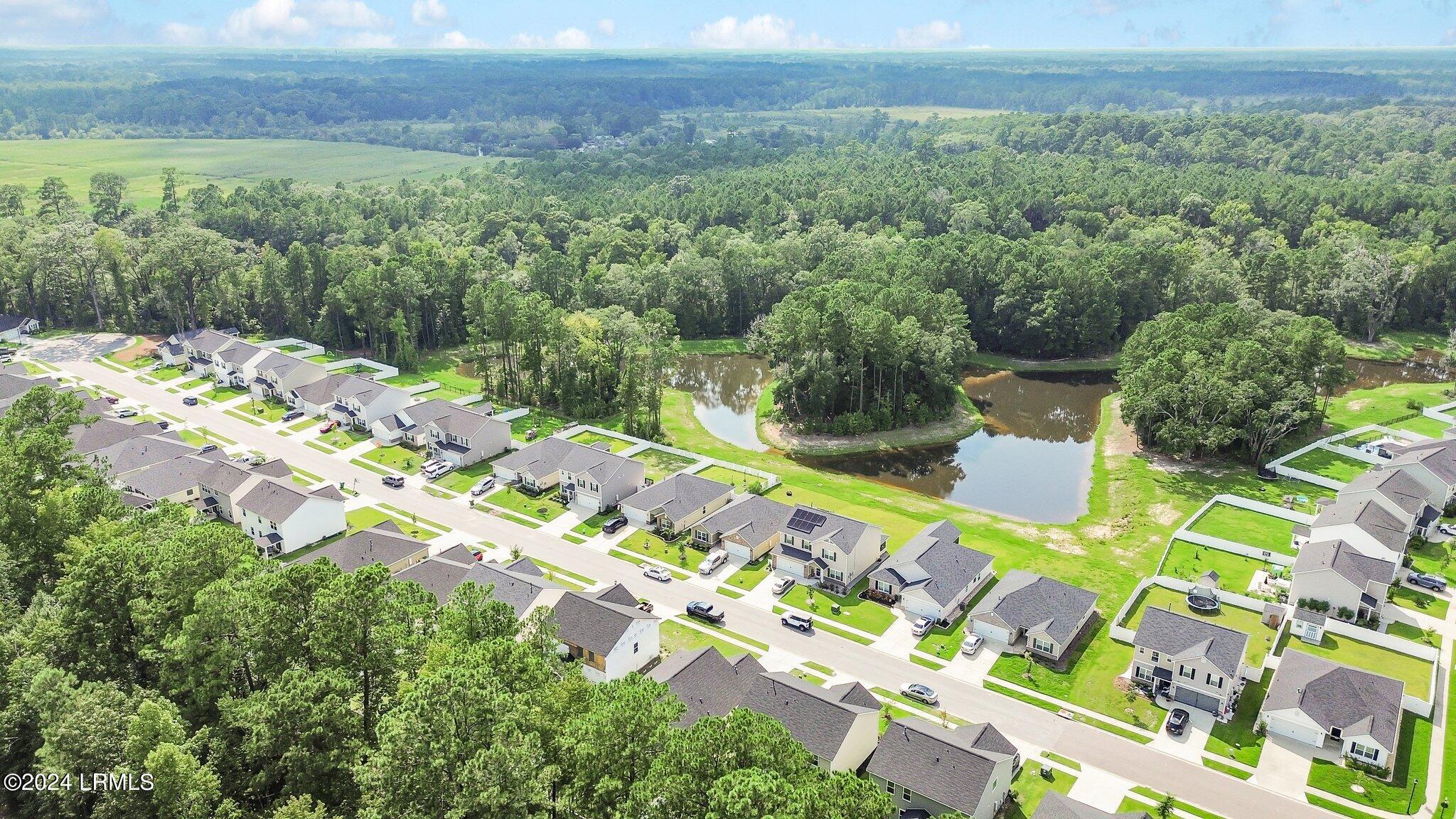 79 Old Mill Crossing Bluffton, SC 29910 - Photo 37 of 41 56-web-or-mls-dji_fly_20240811_231252_50