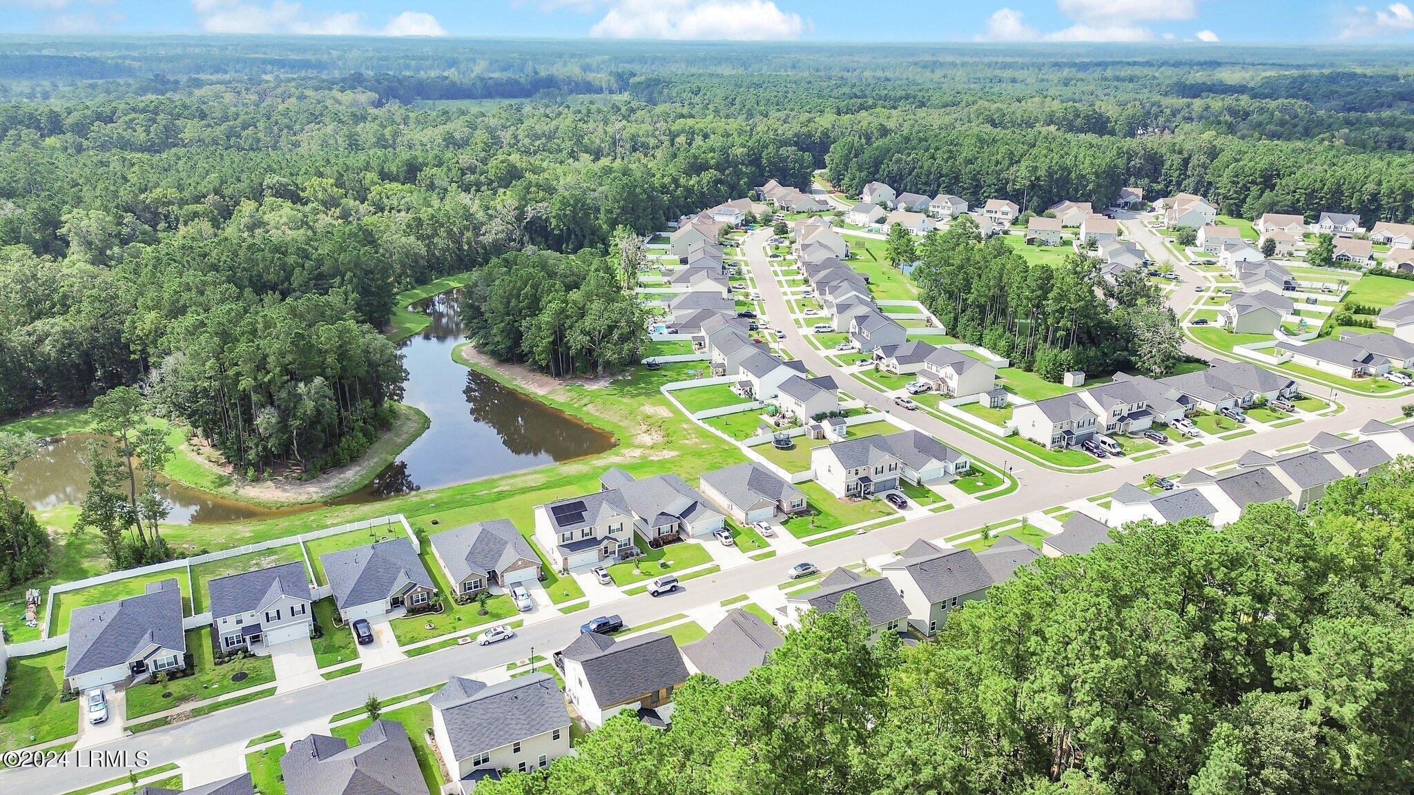 79 Old Mill Crossing Bluffton, SC 29910 - Photo 38 of 41 57-web-or-mls-dji_fly_20240811_231306_50
