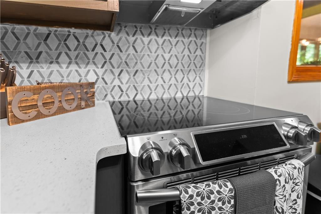 49 Baum Weg Helen, GA 30545 - Photo 15 of 47 a kitchen with a stove and a microwave