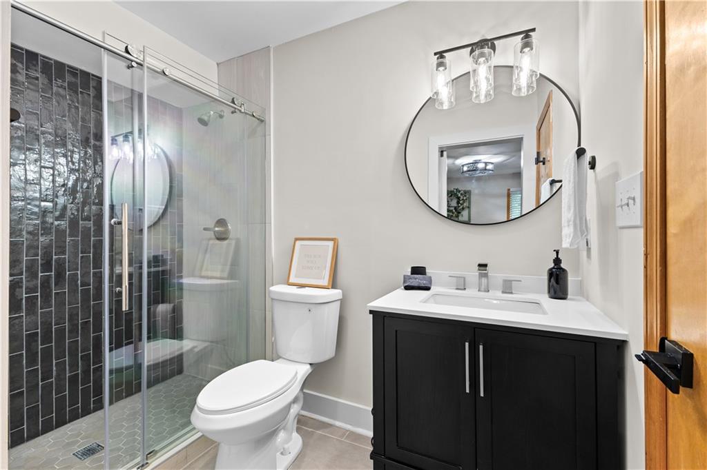 49 Baum Weg Helen, GA 30545 - Photo 20 of 47 a bathroom with a toilet sink and shower