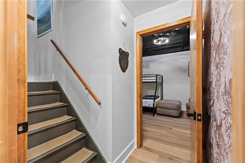 49 Baum Weg Helen, GA 30545 - Photo 32 of 47 a view of a hallway with wooden floor and entryway