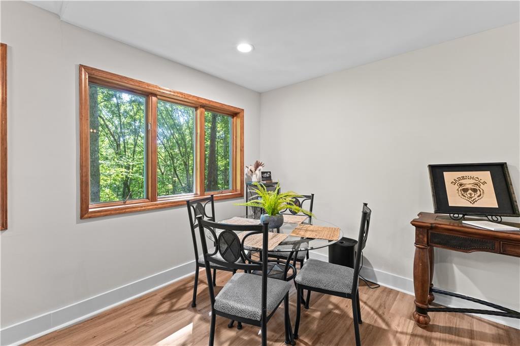 49 Baum Weg Helen, GA 30545 - Photo 9 of 47 a view of a dining room with furniture and a window