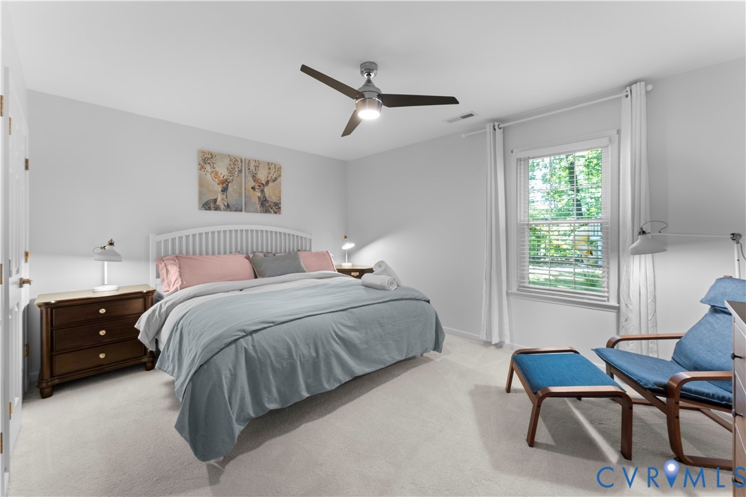 437 Plainview Road Kinsale, VA 22488 - Photo 30 of 63 a bedroom with a bed and a window