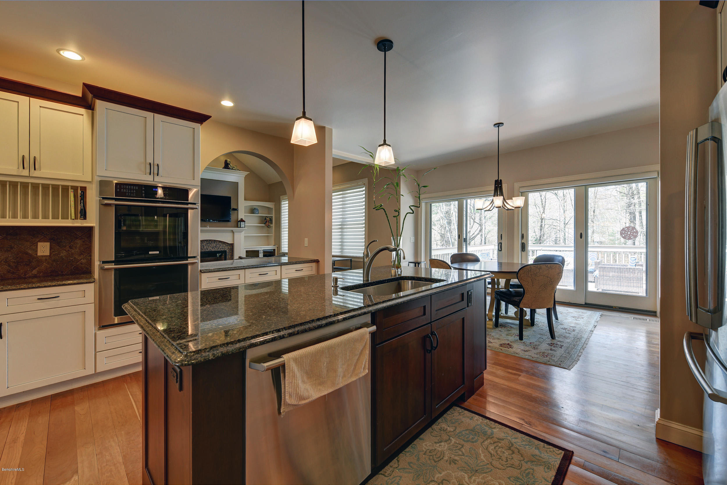 16 Lillybrook Road Pittsfield, MA 01201 - Photo 11 of 38 a kitchen with stainless steel appliances kitchen island a large island in the center